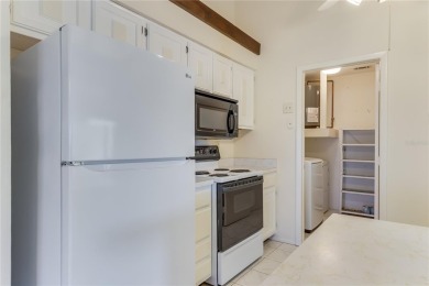 Welcome home to your lovely 2 bedroom, 2 bathroom END UNIT on Sabal Trace Golf and Country Club in Florida - for sale on GolfHomes.com, golf home, golf lot