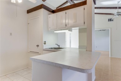 Welcome home to your lovely 2 bedroom, 2 bathroom END UNIT on Sabal Trace Golf and Country Club in Florida - for sale on GolfHomes.com, golf home, golf lot