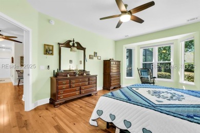 Tucked at the end of a quiet cul-de-sac on a private corner lot on Hidden Cypress Golf Club in South Carolina - for sale on GolfHomes.com, golf home, golf lot
