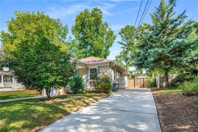 This 3-bedroom, 2-bath brick bungalow blends timeless character on College Park Municipal Golf Course in Georgia - for sale on GolfHomes.com, golf home, golf lot