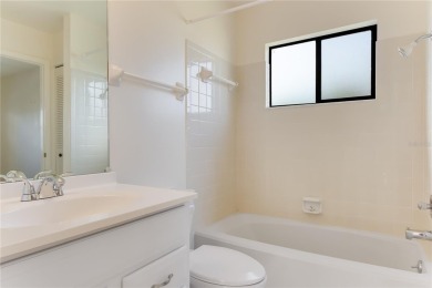Welcome home to your lovely 2 bedroom, 2 bathroom END UNIT on Sabal Trace Golf and Country Club in Florida - for sale on GolfHomes.com, golf home, golf lot