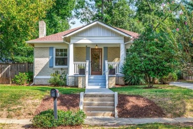 This 3-bedroom, 2-bath brick bungalow blends timeless character on College Park Municipal Golf Course in Georgia - for sale on GolfHomes.com, golf home, golf lot