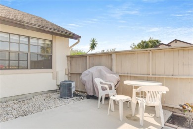 Welcome home to your lovely 2 bedroom, 2 bathroom END UNIT on Sabal Trace Golf and Country Club in Florida - for sale on GolfHomes.com, golf home, golf lot
