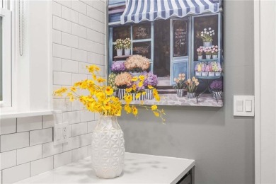 This 3-bedroom, 2-bath brick bungalow blends timeless character on College Park Municipal Golf Course in Georgia - for sale on GolfHomes.com, golf home, golf lot