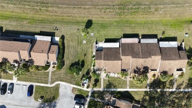 Welcome home to your lovely 2 bedroom, 2 bathroom END UNIT on Sabal Trace Golf and Country Club in Florida - for sale on GolfHomes.com, golf home, golf lot