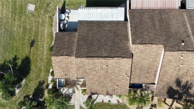 Welcome home to your lovely 2 bedroom, 2 bathroom END UNIT on Sabal Trace Golf and Country Club in Florida - for sale on GolfHomes.com, golf home, golf lot