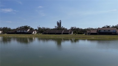 Welcome home to your lovely 2 bedroom, 2 bathroom END UNIT on Sabal Trace Golf and Country Club in Florida - for sale on GolfHomes.com, golf home, golf lot