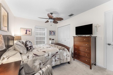 Immaculate first floor end-unit townhome showcasing tranquil on Riverbend Golf Club in Florida - for sale on GolfHomes.com, golf home, golf lot