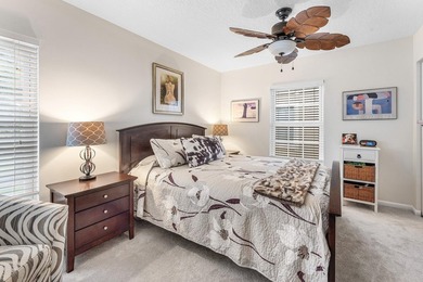 Immaculate first floor end-unit townhome showcasing tranquil on Riverbend Golf Club in Florida - for sale on GolfHomes.com, golf home, golf lot