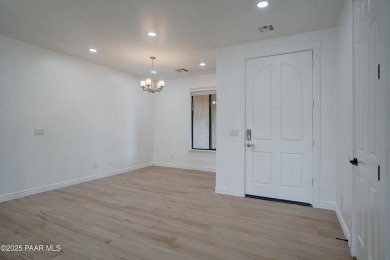 Beautifully updated, single‑level retreat in Prescott on Prescott Lakes Golf and Country Club in Arizona - for sale on GolfHomes.com, golf home, golf lot