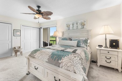 Immaculate first floor end-unit townhome showcasing tranquil on Riverbend Golf Club in Florida - for sale on GolfHomes.com, golf home, golf lot