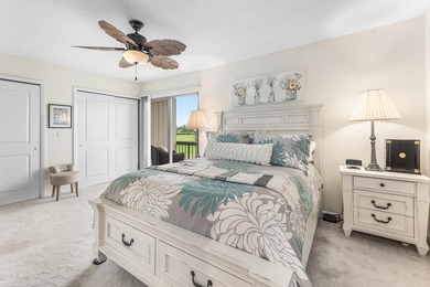 Immaculate first floor end-unit townhome showcasing tranquil on Riverbend Golf Club in Florida - for sale on GolfHomes.com, golf home, golf lot