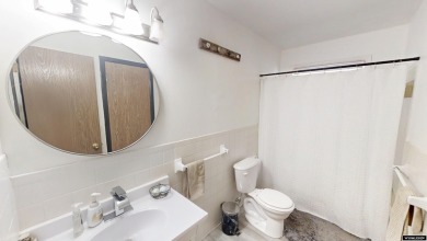 Don't Miss this corner lot beauty! Walking distance from on Paradise Valley Country Club in Wyoming - for sale on GolfHomes.com, golf home, golf lot