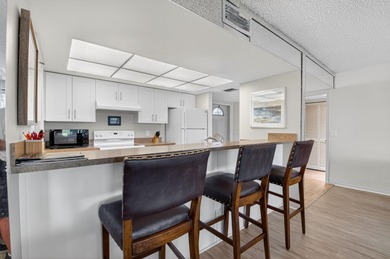 HIGHLY SOUGHT AFTER COURTSIDE 2 BEDROOM, 2 BATHROOM GROUND FLOOR on Boca West Golf and Country Club in Florida - for sale on GolfHomes.com, golf home, golf lot