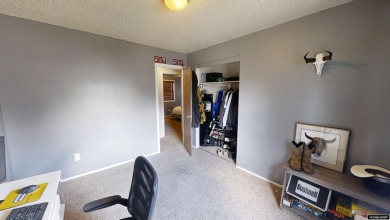 Don't Miss this corner lot beauty! Walking distance from on Paradise Valley Country Club in Wyoming - for sale on GolfHomes.com, golf home, golf lot