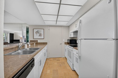 HIGHLY SOUGHT AFTER COURTSIDE 2 BEDROOM, 2 BATHROOM GROUND FLOOR on Boca West Golf and Country Club in Florida - for sale on GolfHomes.com, golf home, golf lot