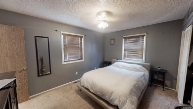 Don't Miss this corner lot beauty! Walking distance from on Paradise Valley Country Club in Wyoming - for sale on GolfHomes.com, golf home, golf lot