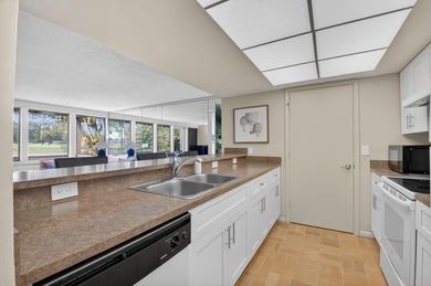 HIGHLY SOUGHT AFTER COURTSIDE 2 BEDROOM, 2 BATHROOM GROUND FLOOR on Boca West Golf and Country Club in Florida - for sale on GolfHomes.com, golf home, golf lot