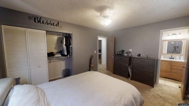 Don't Miss this corner lot beauty! Walking distance from on Paradise Valley Country Club in Wyoming - for sale on GolfHomes.com, golf home, golf lot