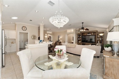 Welcome to this METICULOUSLY MAINTAINED LANTANA DESIGNER MODEL on The Links of Spruce Creek in Florida - for sale on GolfHomes.com, golf home, golf lot