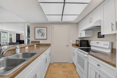 HIGHLY SOUGHT AFTER COURTSIDE 2 BEDROOM, 2 BATHROOM GROUND FLOOR on Boca West Golf and Country Club in Florida - for sale on GolfHomes.com, golf home, golf lot