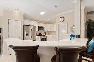 Welcome to this METICULOUSLY MAINTAINED LANTANA DESIGNER MODEL on The Links of Spruce Creek in Florida - for sale on GolfHomes.com, golf home, golf lot