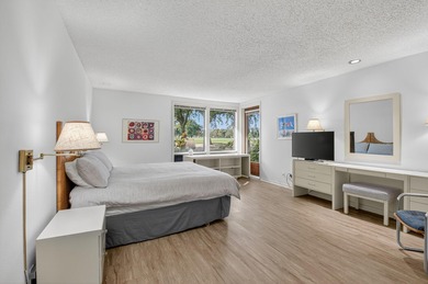 HIGHLY SOUGHT AFTER COURTSIDE 2 BEDROOM, 2 BATHROOM GROUND FLOOR on Boca West Golf and Country Club in Florida - for sale on GolfHomes.com, golf home, golf lot