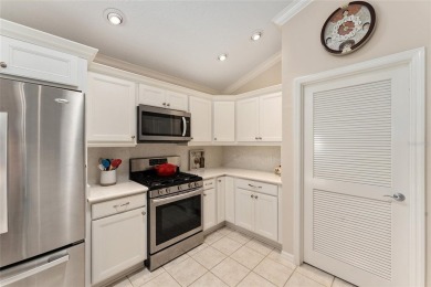 Welcome to this METICULOUSLY MAINTAINED LANTANA DESIGNER MODEL on The Links of Spruce Creek in Florida - for sale on GolfHomes.com, golf home, golf lot