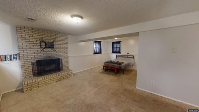 Don't Miss this corner lot beauty! Walking distance from on Paradise Valley Country Club in Wyoming - for sale on GolfHomes.com, golf home, golf lot