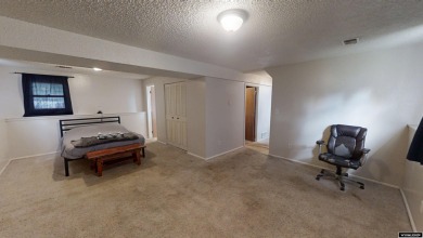 Don't Miss this corner lot beauty! Walking distance from on Paradise Valley Country Club in Wyoming - for sale on GolfHomes.com, golf home, golf lot