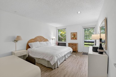 HIGHLY SOUGHT AFTER COURTSIDE 2 BEDROOM, 2 BATHROOM GROUND FLOOR on Boca West Golf and Country Club in Florida - for sale on GolfHomes.com, golf home, golf lot