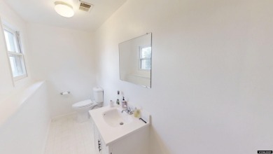 Don't Miss this corner lot beauty! Walking distance from on Paradise Valley Country Club in Wyoming - for sale on GolfHomes.com, golf home, golf lot