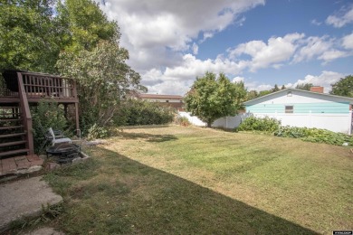 Don't Miss this corner lot beauty! Walking distance from on Paradise Valley Country Club in Wyoming - for sale on GolfHomes.com, golf home, golf lot