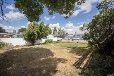 Don't Miss this corner lot beauty! Walking distance from on Paradise Valley Country Club in Wyoming - for sale on GolfHomes.com, golf home, golf lot
