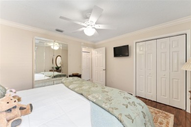 Welcome to this METICULOUSLY MAINTAINED LANTANA DESIGNER MODEL on The Links of Spruce Creek in Florida - for sale on GolfHomes.com, golf home, golf lot