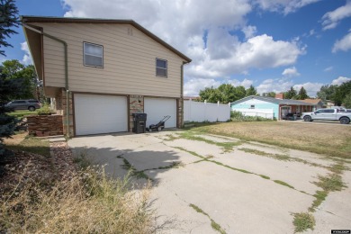 Don't Miss this corner lot beauty! Walking distance from on Paradise Valley Country Club in Wyoming - for sale on GolfHomes.com, golf home, golf lot