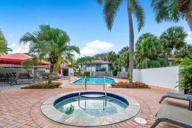 HIGHLY SOUGHT AFTER COURTSIDE 2 BEDROOM, 2 BATHROOM GROUND FLOOR on Boca West Golf and Country Club in Florida - for sale on GolfHomes.com, golf home, golf lot