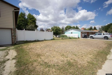 Don't Miss this corner lot beauty! Walking distance from on Paradise Valley Country Club in Wyoming - for sale on GolfHomes.com, golf home, golf lot