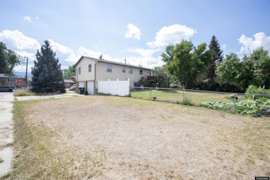 Don't Miss this corner lot beauty! Walking distance from on Paradise Valley Country Club in Wyoming - for sale on GolfHomes.com, golf home, golf lot