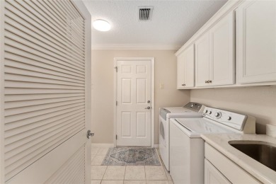 Welcome to this METICULOUSLY MAINTAINED LANTANA DESIGNER MODEL on The Links of Spruce Creek in Florida - for sale on GolfHomes.com, golf home, golf lot
