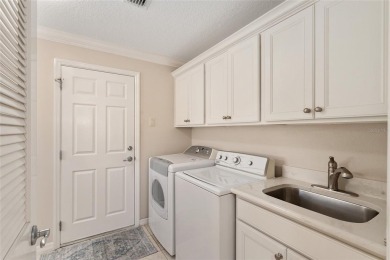 Welcome to this METICULOUSLY MAINTAINED LANTANA DESIGNER MODEL on The Links of Spruce Creek in Florida - for sale on GolfHomes.com, golf home, golf lot