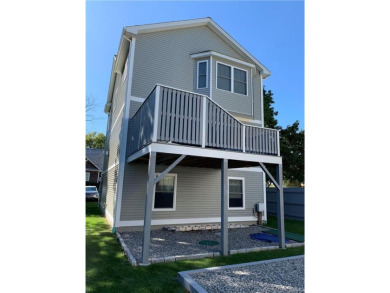 Welcome to your dream retreat in the beautiful, coastal exclave on Potowomut Golf Club in Rhode Island - for sale on GolfHomes.com, golf home, golf lot