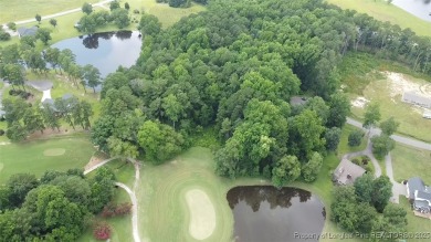 Your Private Escape on the 15th Hole! Rare opportunity to own on Quail Ridge Golf Course in North Carolina - for sale on GolfHomes.com, golf home, golf lot