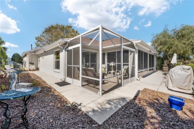 Welcome to this METICULOUSLY MAINTAINED LANTANA DESIGNER MODEL on The Links of Spruce Creek in Florida - for sale on GolfHomes.com, golf home, golf lot