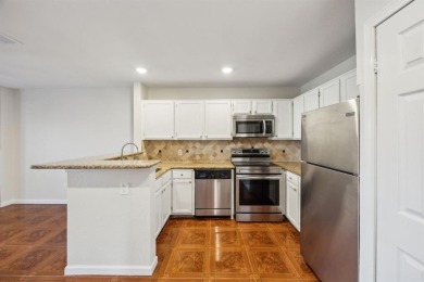 This spacious 2 bedroom, 2 bath condo with an open-concept on Royal Oaks Country Club in Texas - for sale on GolfHomes.com, golf home, golf lot