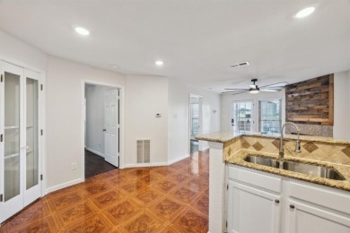 This spacious 2 bedroom, 2 bath condo with an open-concept on Royal Oaks Country Club in Texas - for sale on GolfHomes.com, golf home, golf lot