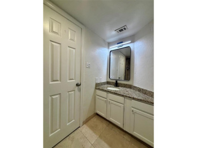 This spacious 2 bedroom, 2 bath condo with an open-concept on Royal Oaks Country Club in Texas - for sale on GolfHomes.com, golf home, golf lot