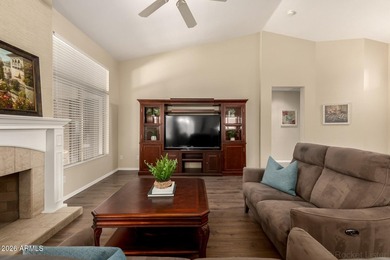 Turn-key! This popular Augusta floorplan is tucked away in a on Tuscany Falls At Pebble Creek in Arizona - for sale on GolfHomes.com, golf home, golf lot