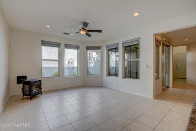 Lovely home located on a charming tree-lined street in the heart on StoneRidge Golf Course in Arizona - for sale on GolfHomes.com, golf home, golf lot
