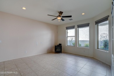 Lovely home located on a charming tree-lined street in the heart on StoneRidge Golf Course in Arizona - for sale on GolfHomes.com, golf home, golf lot